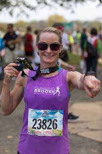 Brooke at 2016 Marine Corps Marathon with Finishers Medal